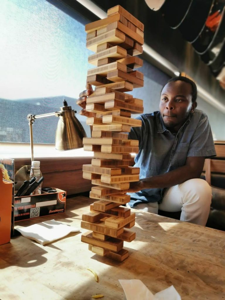 A tense game of Jenga with the white pants I got from a friend back in 2017.